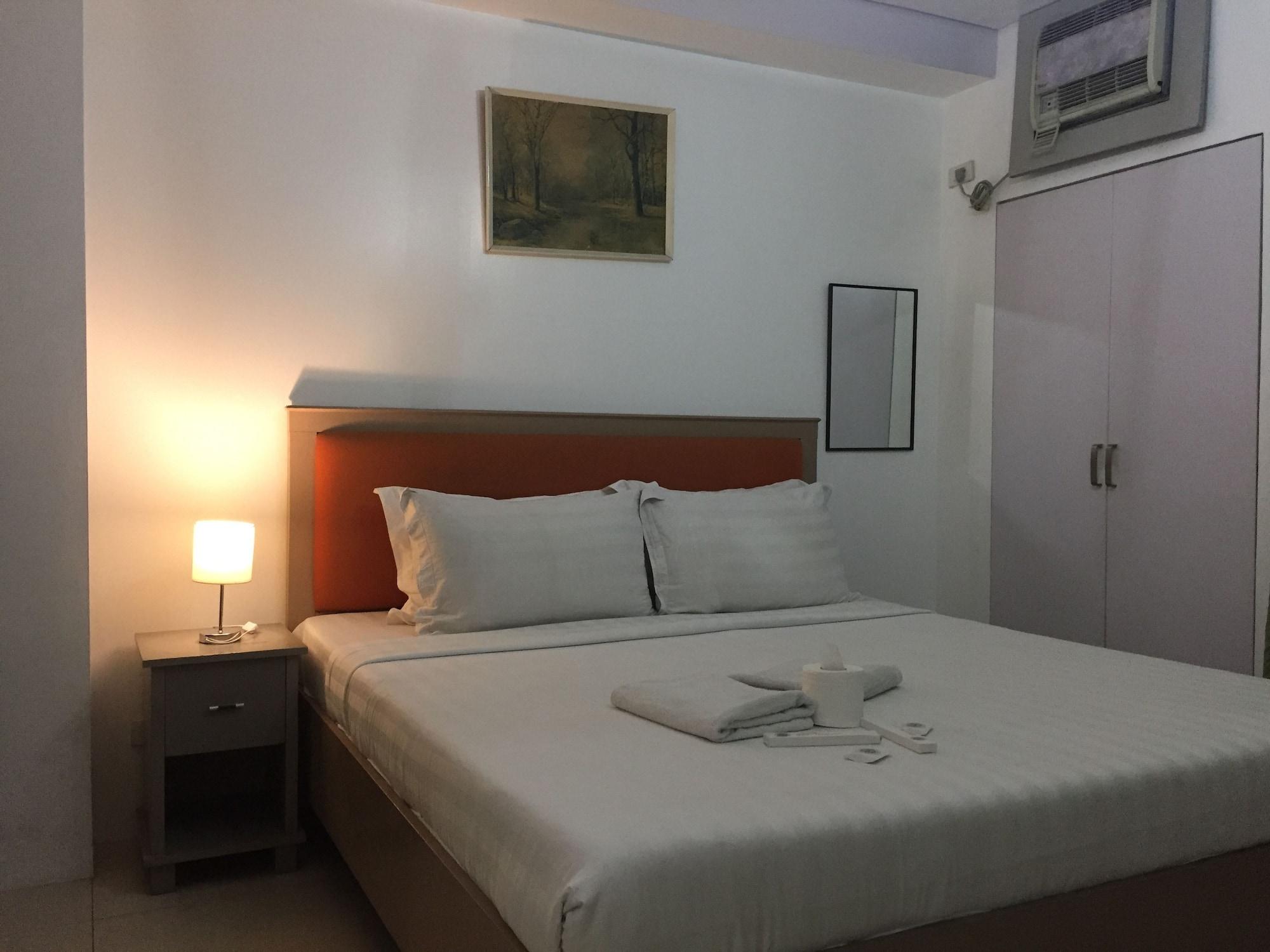 Dragonlink Suites Макати Экстерьер фото