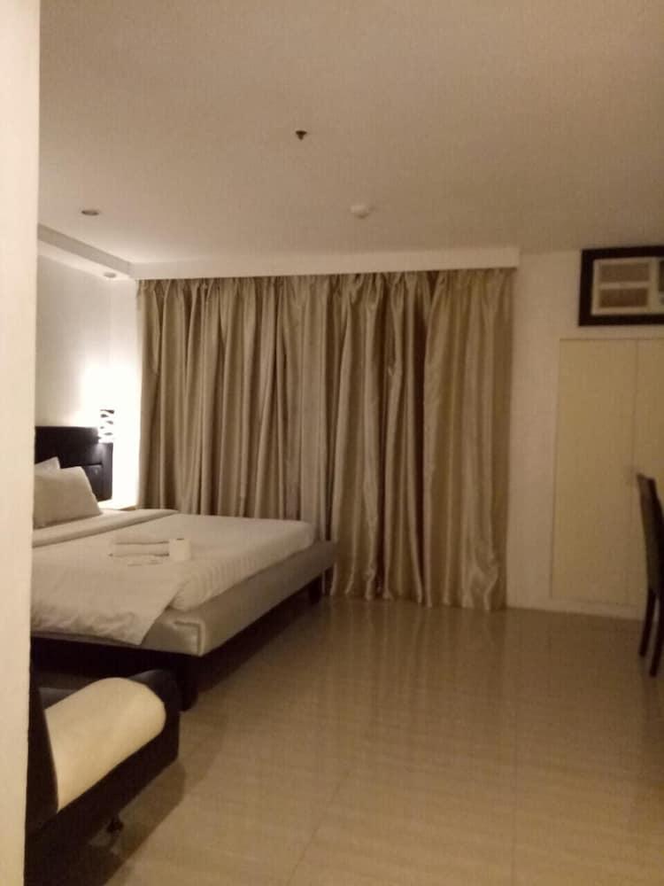Dragonlink Suites Макати Экстерьер фото