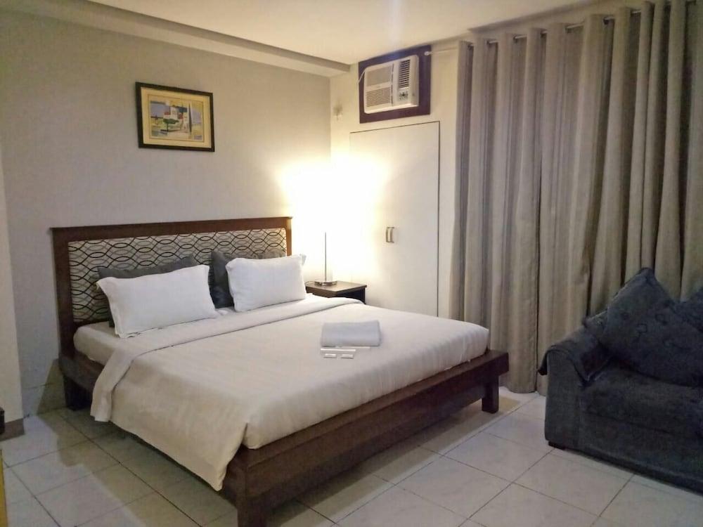 Dragonlink Suites Макати Экстерьер фото