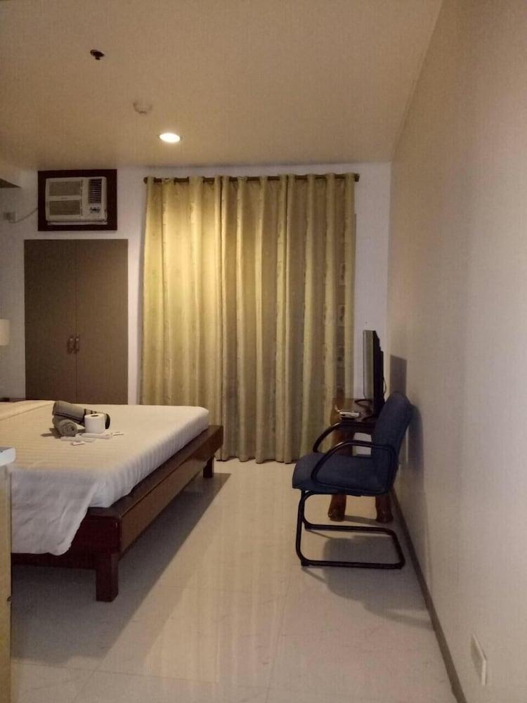 Dragonlink Suites Макати Экстерьер фото