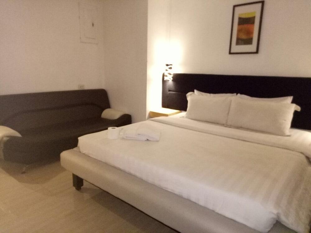 Dragonlink Suites Макати Экстерьер фото